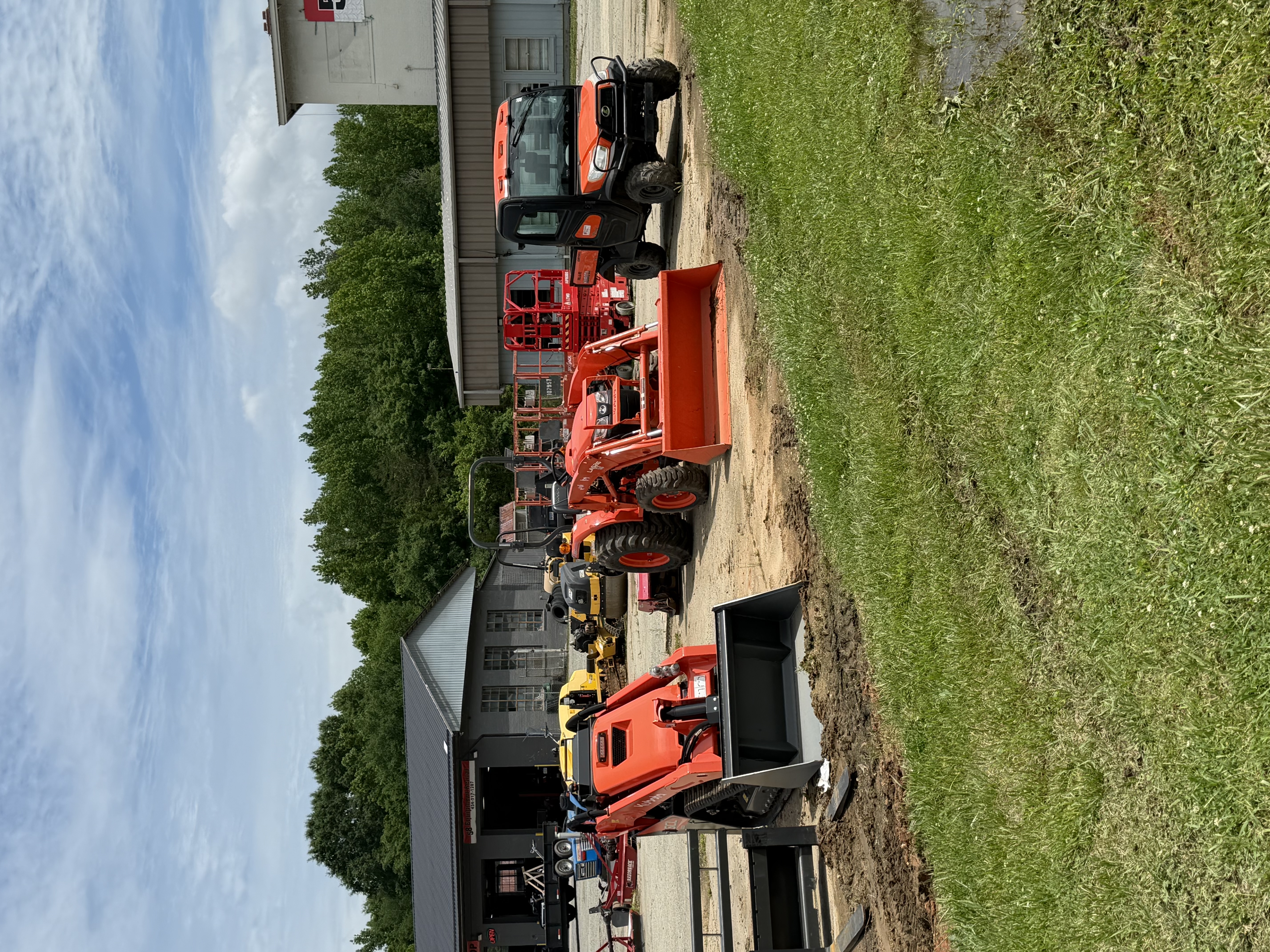 Kubota tractor with front loader and other utility equipment at 58 Equipment Rentals, Halifax County VA